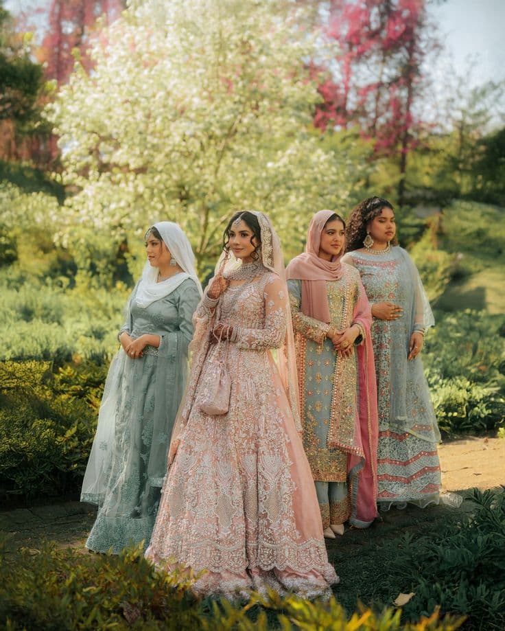 Women in traditional attire outdoors